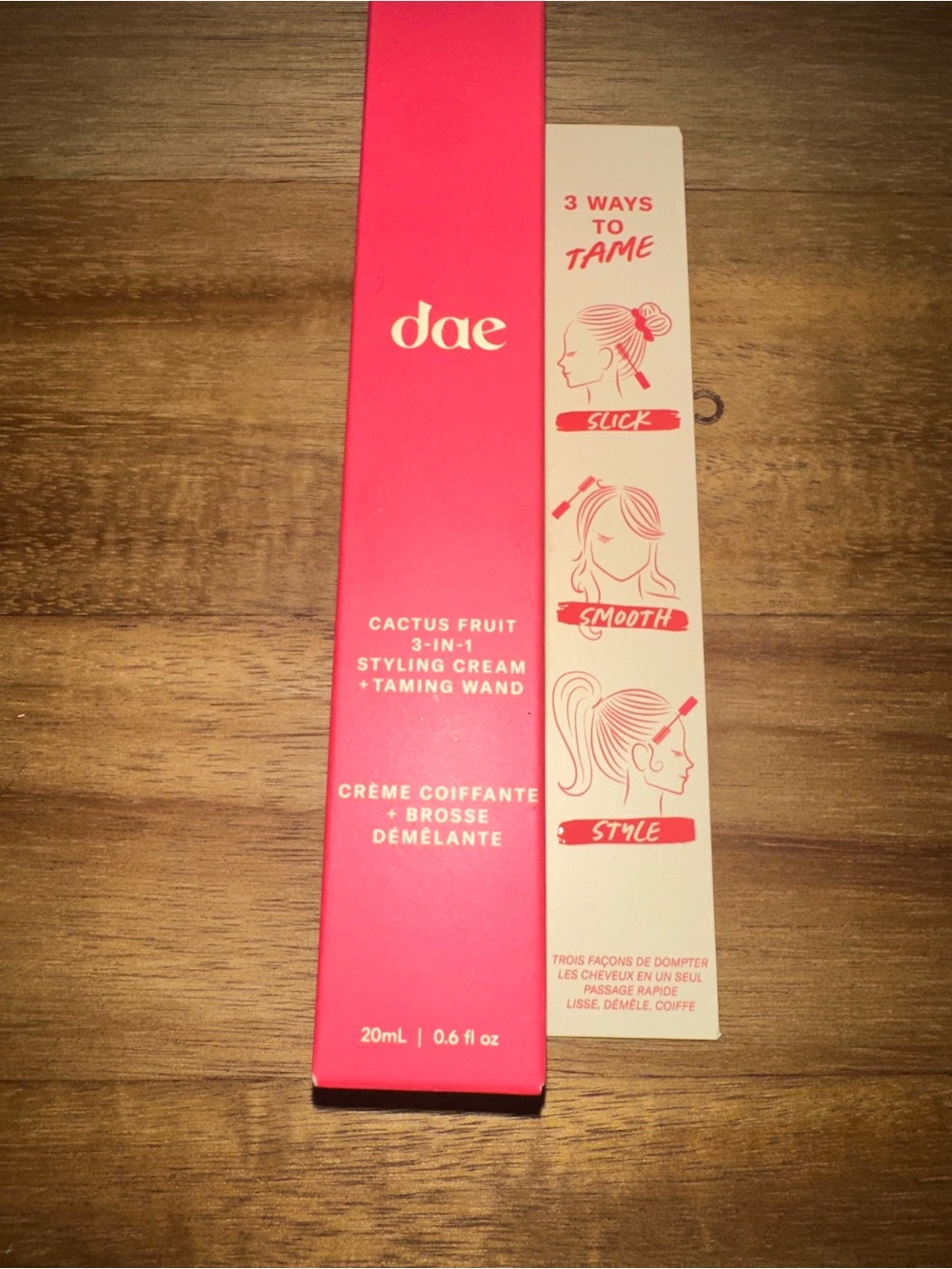 American Eagle Outfitters styling cream + taming wand — pink and cream packaging